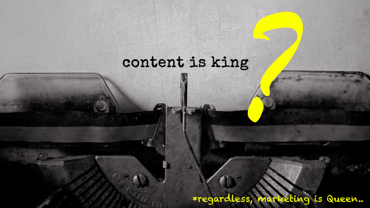 typewriter with text CONTENT IS KING?